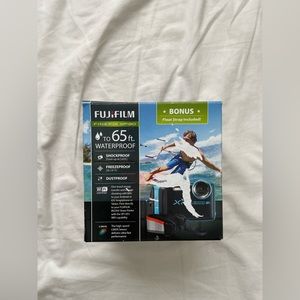 Fujifilm camera blue waterproof with float strap. OPEN TO OFFERS!